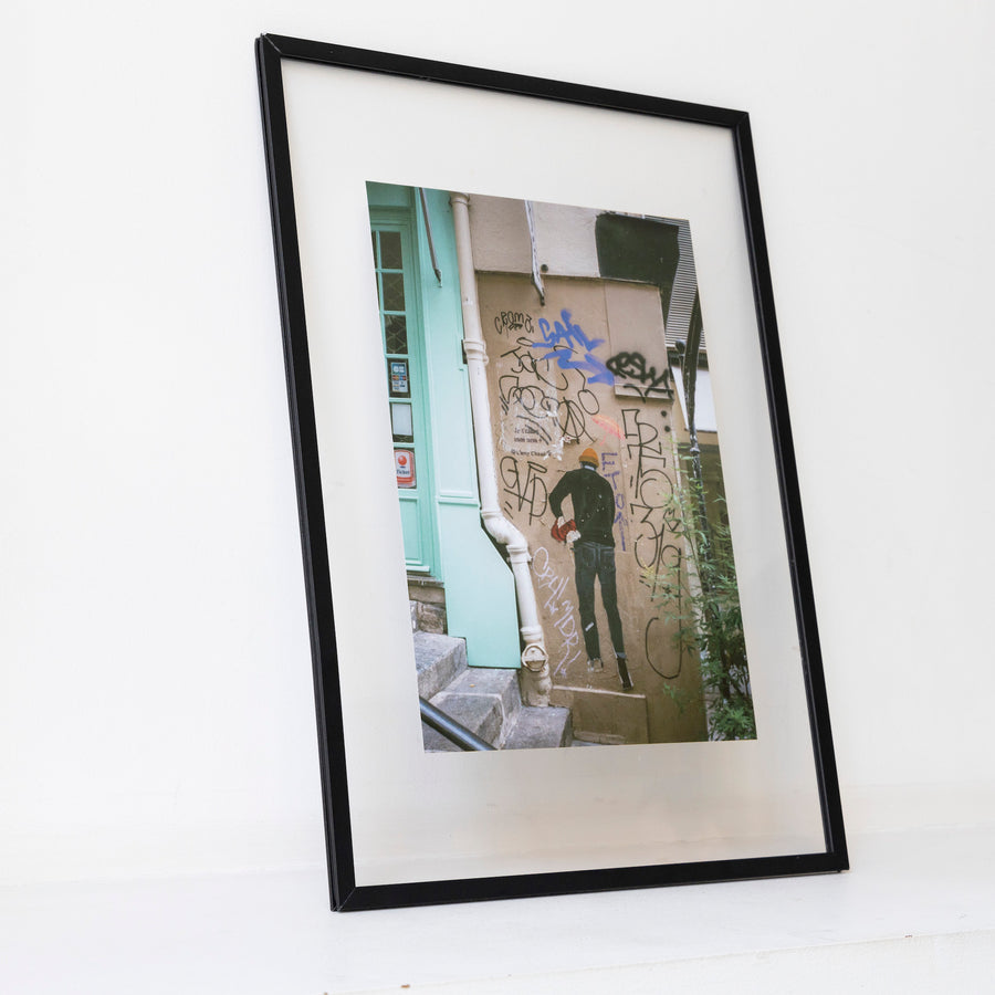 People heading to the wall in Paris / A3 bk frame