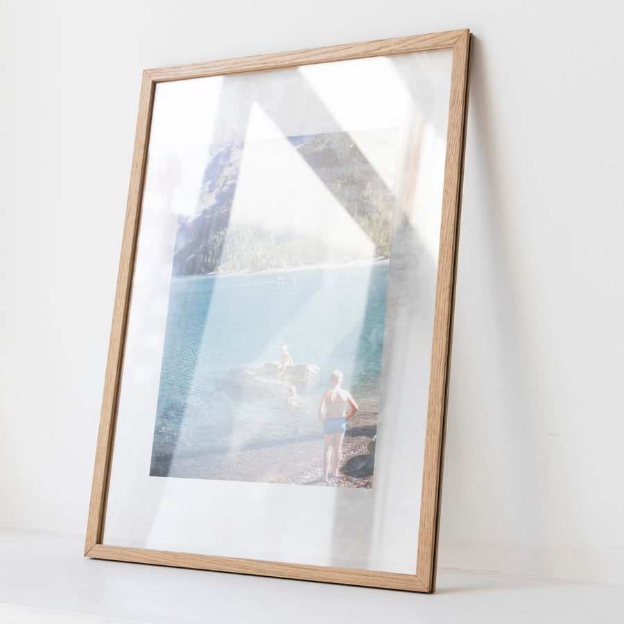 Child playing on the lake / A3 oak frame